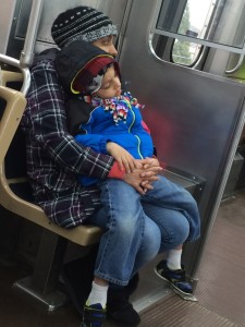 child sleeping on el